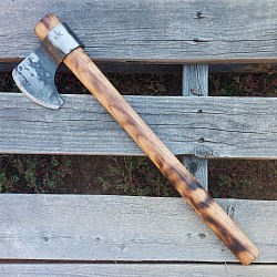 Axe 1 - this tool features a wrapped head that is hand forged out of 5160 steel and has a 3 1/2