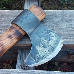 Axe 1 - this tool features a wrapped head that is hand forged out of 5160 steel and has a 3 1/2