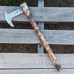 Axe 2 - the head of this axe was forged from a king pin that was used on a F650 tow truck. The bit measures 4 1/2