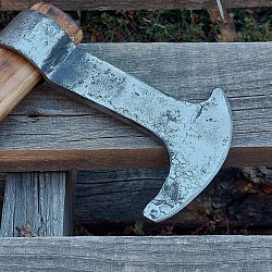 Axe 2 - the head of this axe was forged from a king pin that was used on a F650 tow truck. The bit measures 4 1/2