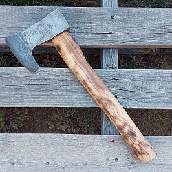 Axe 4 - this hatchet features a hand forged ball bearing damascus bit measuring 4