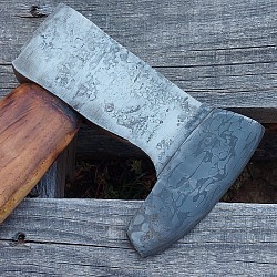 Axe 4 - this hatchet features a hand forged ball bearing damascus bit measuring 4
